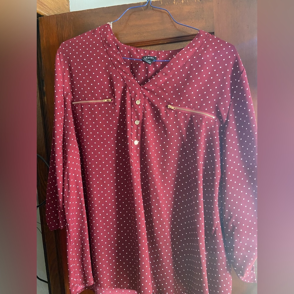 Red and white polkadot shirt